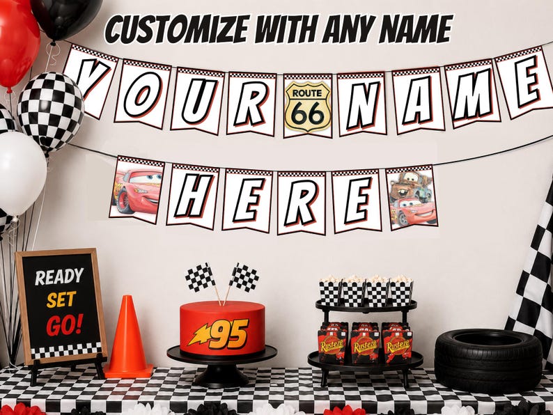 May include: A party banner with white pennants featuring black and red lettering that reads YOUR NAME HERE, including a Route 66 sign and images of red race cars. The banner is displayed above a table with a red cake, checkered decor, and balloons.