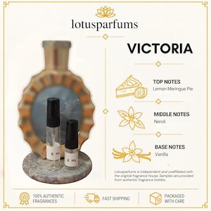 May include: Two clear glass fragrance sample vials with black caps, labeled 5 ml and 2 ml, stand before a decorative gold-rimmed bottle. The text reads lotusparfums, VICTORIA, TOP NOTES Lemon Meringue Pie, MIDDLE NOTES Neroli, and BASE NOTES Vanilla.