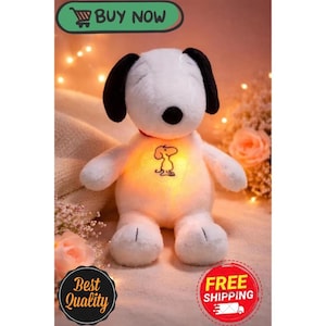 May include: A plush Snoopy toy with black ears, a black nose, and a red collar. The toy has a glowing belly with a Snoopy graphic. The image includes the text "BUY NOW" and "Best Quality".