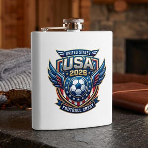 White flask with USA 2026 Football Crest logo featuring wings and a soccer ball.