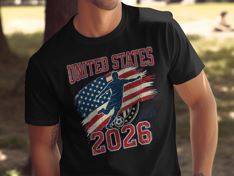 Black t-shirt with "UNITED STATES 2026 SOCCER" and US flag graphic.