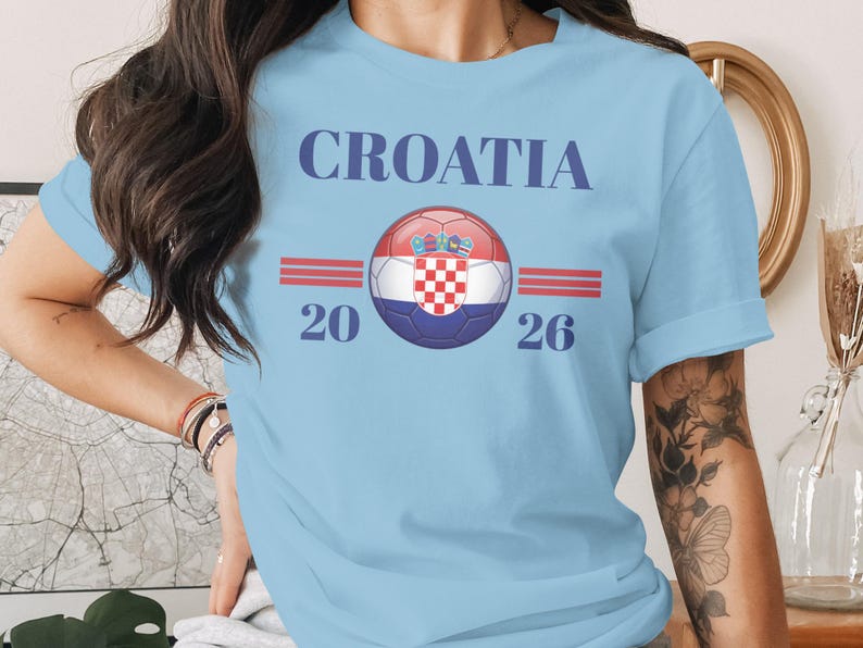 Light blue t-shirt with "Croatia 20 26" and a Croatian flag soccer ball.