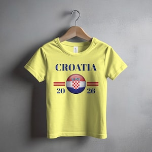 Yellow t-shirt with "CROATIA 2026" and Croatian flag emblem.