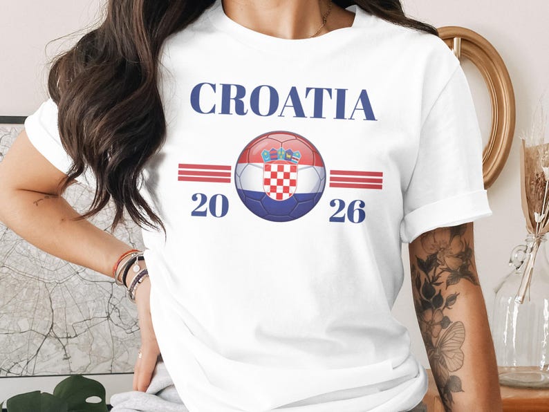 White t-shirt with "CROATIA 20 26" and a soccer ball with Croatian flag.