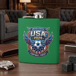 Green flask with "USA 2026 Football Crest" and winged soccer ball logo.