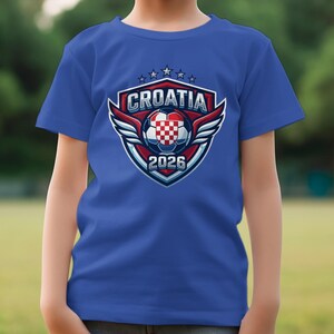 Blue t-shirt featuring a Croatia soccer team logo with 2026.