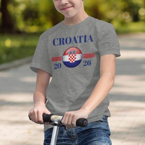 Grey t-shirt with "Croatia 2026" and Croatian flag design.