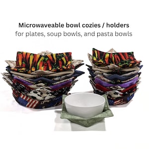 May include: Two stacks of fabric bowl cozies and holders for plates, soup bowls, and pasta bowls, featuring various colorful patterns including chili peppers, soccer balls, and American flags, with one white bowl resting in a green fabric cozy.