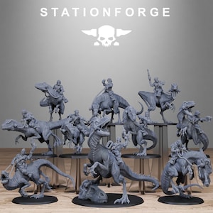 May include: A collection of gray resin miniature figures featuring soldiers riding dinosaurs. The figures are displayed on individual circular bases. The text STATIONFORGE is printed at the top with a skull and anvil logo below it.