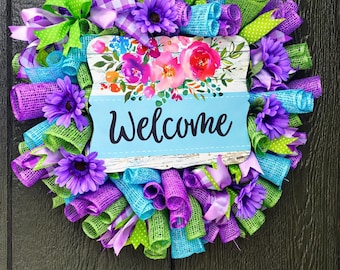 Ghirlanda di benvenuto dai colori vivaci e freddi