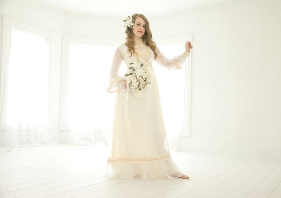 white wedding dress with pink accents