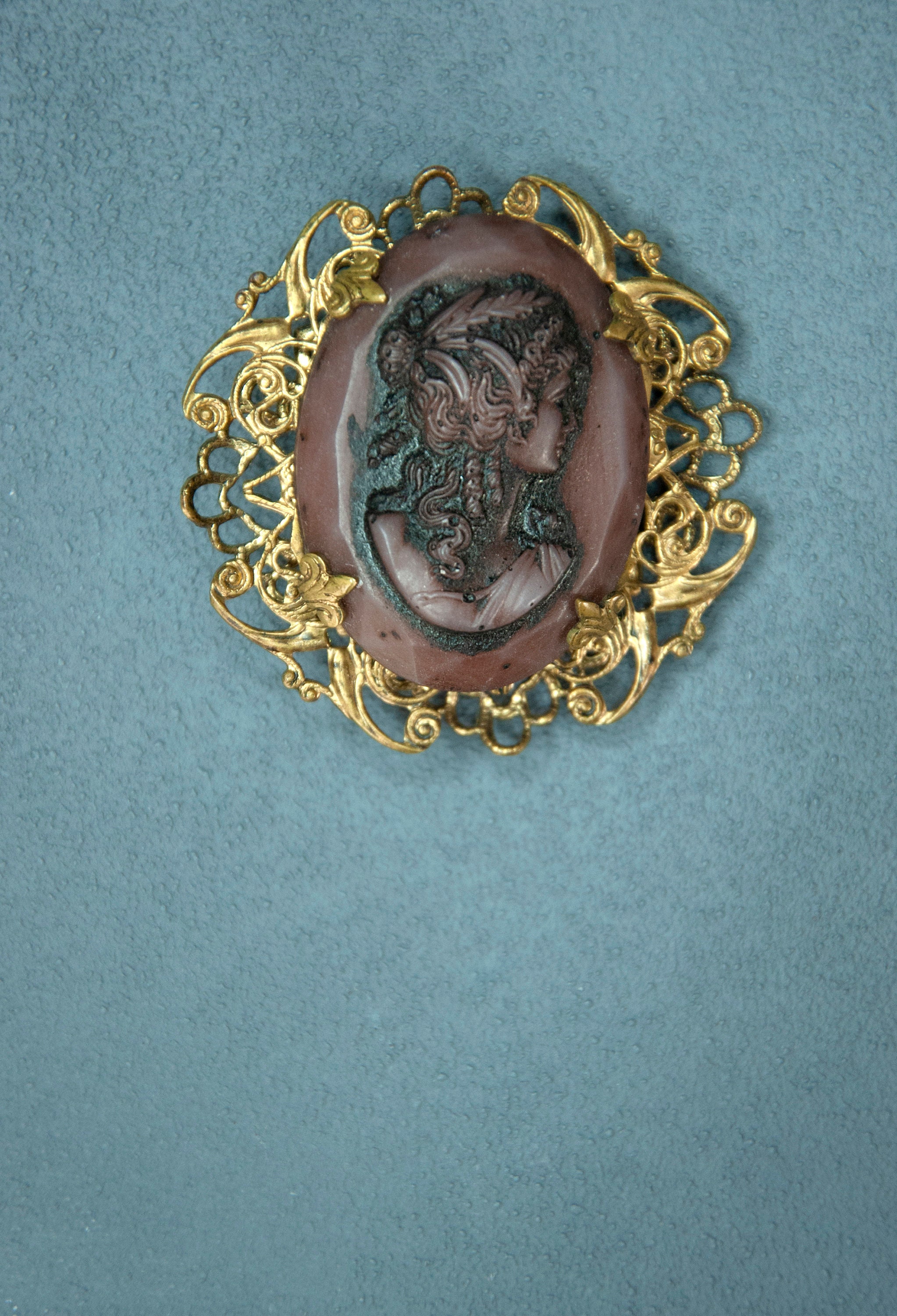 purple cameo brooch