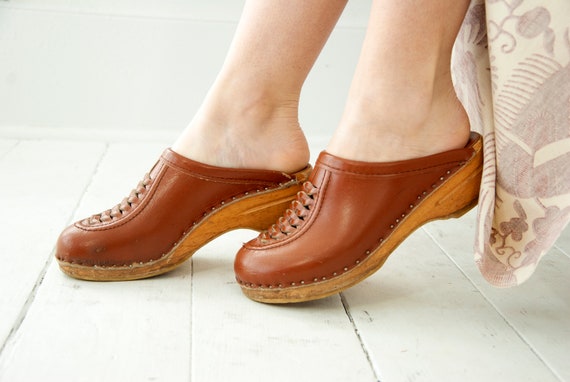 brown wooden clogs