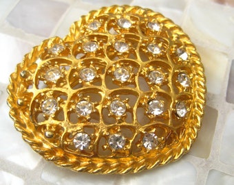 Clear Rhinestone & Gold Filigree Heart Brooch. Slightly Domed Heart Pin has 4mm Rhinestones (21) Scattered Throughout. 1.5" H x 1.75" W