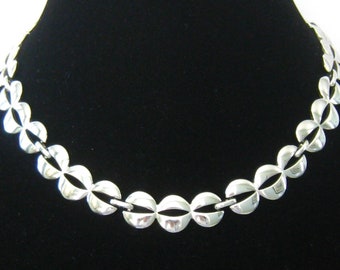 MONET Silver Tone Choker Necklace. Finish Like New.  Mildly Contoured  Slotted Triple-Disc Links. Has Extender and measures 14" to 16.25" L