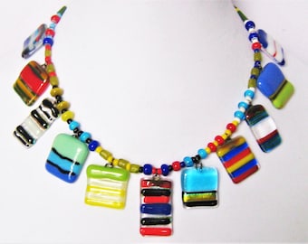 Fused Glass Charm Necklace.  Vintage Artisan. 12 Multicolor Striped Fused Drops on Multicolor Glass Bead Strand.  18" Long. Sterling Clasp.