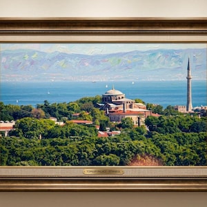 May include: Framed painting of Topkapi Palace, Istanbul. The artwork shows a domed building and a minaret on a green hill, with a blue sea and mountains in the background. The frame is a dark, ornate wood.