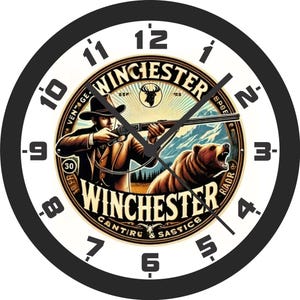 May include: Round wall clock with a black frame and a white face. The clock face features a vintage illustration of a hunter aiming a rifle at a bear, with the word "Winchester" prominently displayed.