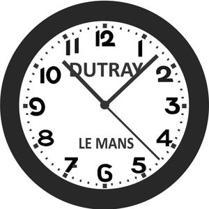 May include: A round, black and white clock with the text "DUTRAY" above "LE MANS". The clock face has black hands and a black bezel. The numbers are in a classic font.