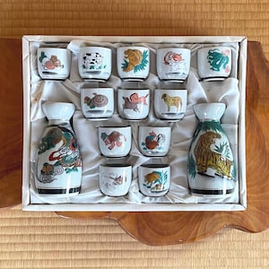 Japanese porcelain sake set with the 12 signs of the zodiac - vintage hand-painted