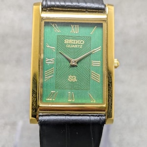 Seiko Quartz Rectangular Green Dial Black Band Roman Numerals Men,s Watch