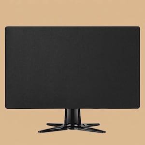 May include: A black rectangular table with a textured surface. The table is supported by a black pedestal base with a star-shaped foot. The background is a solid tan color.