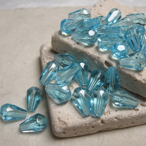 10x7mm Facet Glass Teardrop Beads in Aquamarine.  2 dz.