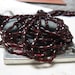 Czech Glass 8x3mm Rice Beads in Garnet. 4 dz.