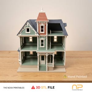 May include: A multi-story dollhouse featuring sage green exterior walls, a dark blue roof, and a central tower with a terracotta-colored roof. The structure includes white window frames, a front porch with stairs, and interior levels. Text reads: Hand Painted, 3D STL FILE, THE NOVA PRINTABLES.