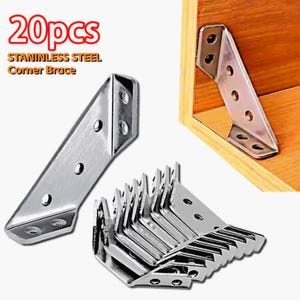 May include: A collection of stainless steel corner braces. The image shows multiple metal brackets with pre-drilled holes, designed for reinforcing corners. The text in the image reads "20pcs STAINLESS STEEL Corner Brace". One brace is installed in a wooden corner.