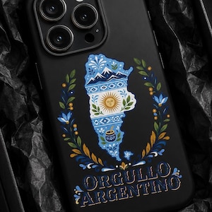 May include: A black smartphone case featuring a graphic of the map of Argentina filled with the national flag colors, a sun emblem, and a mate gourd. The design is surrounded by a floral wreath and includes the text ORGULLO ARGENTINO in blue.