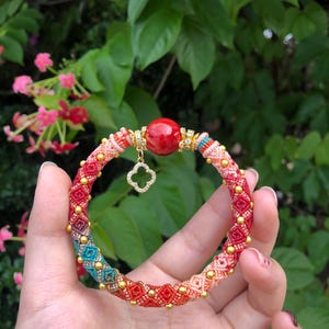 Red Pink Macrame Bracelet, Handwoven Boho Jewelry with Red Stone & Clover Charm