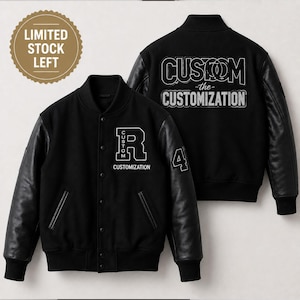 May include: A black varsity jacket with black leather sleeves, a ribbed collar, and snap buttons. The front features a white letter R with the word CUSTOMIZATION. The back displays the text CUSTOM THE CUSTOMIZATION in white block lettering.