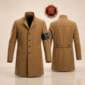 May include: A tan coat featuring a high collar, a front button closure, and quilted shoulder panels. The left sleeve includes a black armband with a circular emblem. The back view displays a horizontal waist strap with two buttons and quilted detailing.