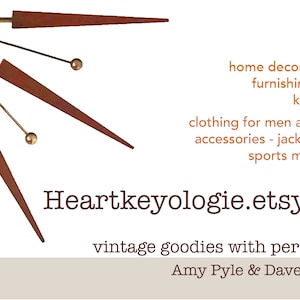 May include: A vintage Etsy shop logo with a gold and brown clock face and the text "Heartkeyologie.etsy.com" and the tagline "vintage goodies with personality" and the names "Amy Pyle & Dave Conover".