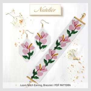 May include: A beaded bracelet and a pair of matching diamond-shaped earrings featuring a white background with a repeating pink hibiscus flower pattern, green leaves, and yellow stamens. The set includes gold-tone metal hardware and clasps.