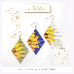 May include: Three diamond-shaped brick stitch earrings featuring sunflower patterns in yellow, orange, and brown. The left earring has a sage green background, the center has a blue background, and the right has a white background. Text reads Natelier.