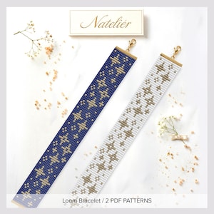 May include: Two loom bracelets featuring a star pattern. One bracelet is dark blue with gold stars, and the other is white with gold stars. Both have gold-tone metal end bars and lobster clasps. The text Natelier and Loom Bracelet 2 PDF PATTERNS appears.
