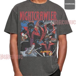May include: A charcoal gray short-sleeve t-shirt featuring a graphic print of the character Nightcrawler from X-Men '97. The design includes the text NIGHTCRAWLER in red at the top and x-men '97 in yellow at the bottom, showcasing multiple action poses.