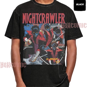 May include: A black acid-wash t-shirt featuring a graphic print of the character Nightcrawler from X-Men '97. The design includes the text NIGHTCRAWLER in red at the top and x-men '97 in yellow at the bottom, with multiple action poses of the blue-skinned character.
