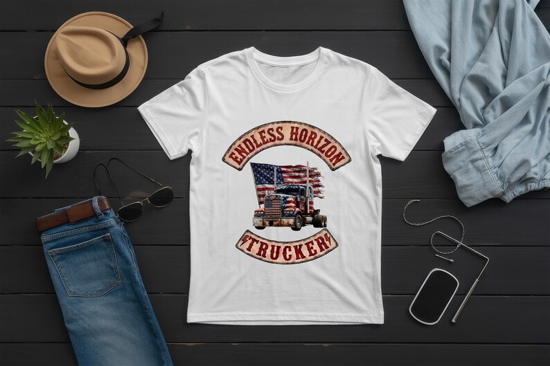 May include: A white short-sleeved t-shirt featuring a graphic of a semi-truck in front of a distressed American flag. The text ENDLESS HORIZON is arched above the truck, and the word TRUCKER is arched below, both in a weathered, vintage-style font.