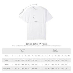 May include: White Comfort Colors 1717 t-shirt with size chart. The chart shows measurements in inches for width, length, and sleeve length, ranging from XS to 5XL. The shirt is displayed with labeled dimensions.