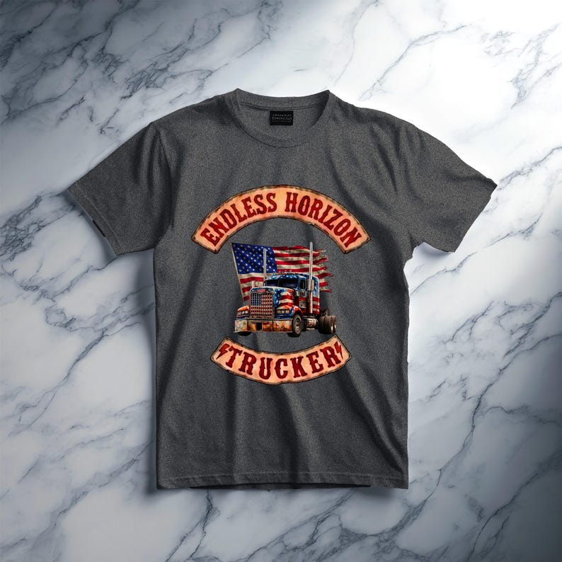 May include: A charcoal grey short-sleeve t-shirt featuring a graphic print of a semi-truck with an American flag design. The text ENDLESS HORIZON is arched above the truck, and the word TRUCKER is arched below, both in a distressed red font.