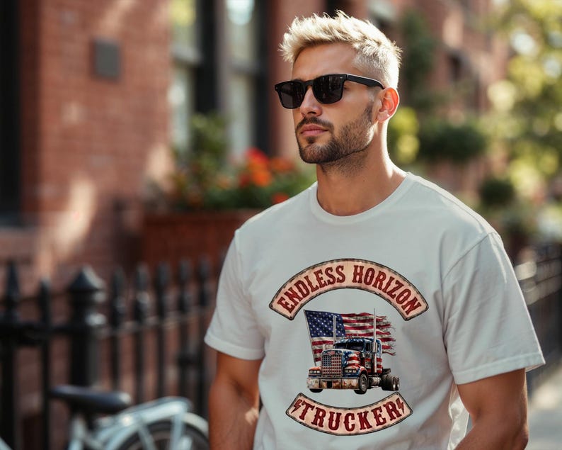 May include: A white short-sleeved t-shirt featuring a graphic print of a semi-truck in front of a distressed American flag. The text ENDLESS HORIZON is arched above the truck, and the word TRUCKER is arched below in a vintage-style font.