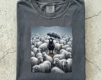 Black Sheep With Umbrella, humorous joke, black sheep, humorous satire, humorous irony, monochrome tone, rebellious streak, Comfort colors