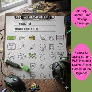May include: A clipboard with a "GAMER FUND" savings challenge sheet, featuring gaming icons. Includes a black and green gaming mouse, headphones, and a highlighter. The text reads "30-Step Gamer Fund Savings Challenge."