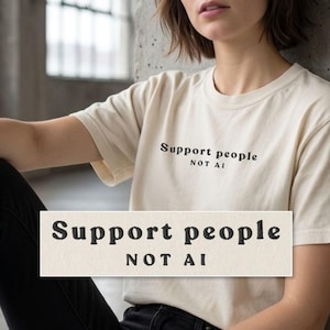 Camiseta bordada anti-IA | Apoie as pessoas, não a inteligência artificial. Cores confortáveis.