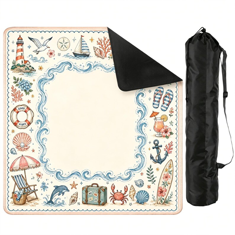 May include: A square outdoor blanket with a cream-colored center and a border featuring illustrations of a lighthouse, sailboat, lifebuoy with the text GOOD VIBES, seashells, a beach chair, dolphin, crab, surfboard, and flip-flops, paired with a black carrying bag.