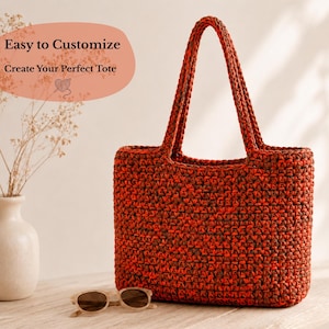 May include: A crochet tote bag featuring a variegated pattern of dark brown and vibrant orange yarn. The bag has two sturdy handles and a rectangular base. Text on the image reads: Easy to Customize, Create Your Perfect Tote.