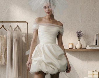 Abito da sposa corto e vaporoso, unico nel suo genere, con strascico in tulle removibile, mini abito Bardot moderno per una sposa alternativa.